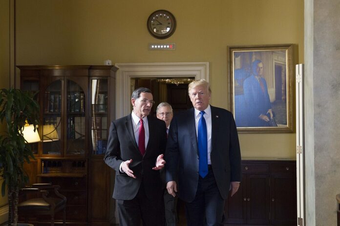 1280px-President_Donald_Trump_and_Chairman_of_the_Senate_Republican_Policy_Committee,_Senator_John_Barrasso,_at_the_U.S._Capitol