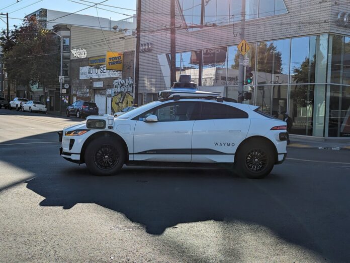 1280px-Waymo_robotaxis,_San_Francisco_2
